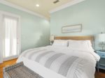 2nd floor master bedroom with a large walk in closet, TV, private balcony
